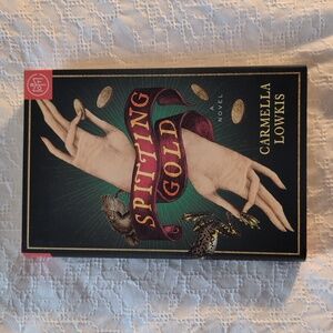 Spitting Gold by Carmella Lowkis